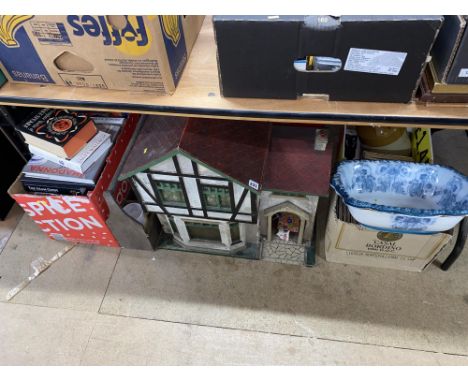 An early 20th Century wooden doll's house, 60cm H, a box of books, a wooden trug, records, stoneware flagon and other items