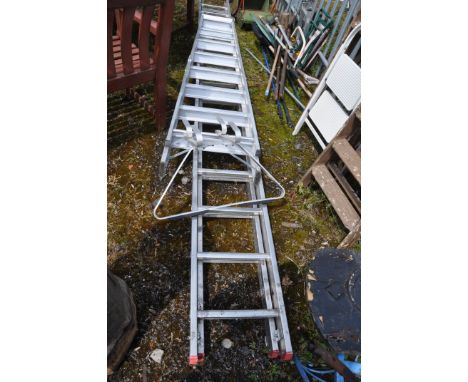 A TITAN ALUMINIUM DOUBLE EXTENSION LADDER with 15 rungs to each 410cm length, a stand off and a step ladder (3)