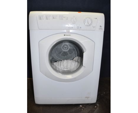 A HOTPOINT TVM562 TUMBLE DRYER with outlet pipe width 60cm depth 60cm height 85cm (PAT pass and working)