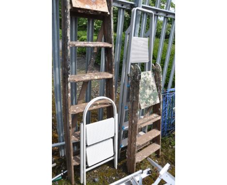 FOUR WOODEN STEP LADDERS, an aluminium step ladder and a steel step (6)