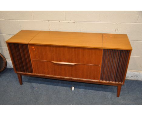 A DYNATRON RG82 RADIO GRAM in teak cabinet with a Garrard model 40B turntable and a SRX26 amplifier (PAT fail due to uninsula