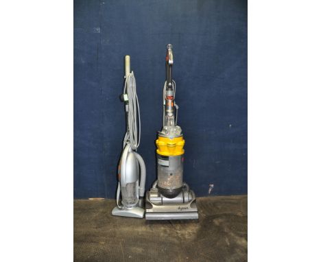 A DYSON DC14 UPRIGHT VACUUM CLEANER and an unbranded stick vacuum (both PAT pass and working)