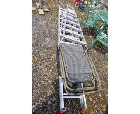 A CLIMA ALUMINIUM DOUBLE EXTENSION LADDER 625cm extended length, two step ladders and a folding garden chair (4)