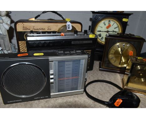 A COLLECTION OF VINTAGE RADIOS, CLOCKS, AND A SET OF HEADPHONES to include a 'Grundig Party Boy 110' radio,  a  'Grundig Musi