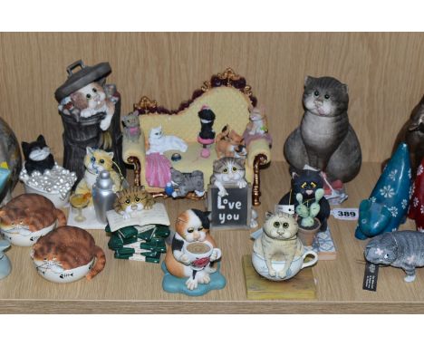 A COLLECTION OF CAT FIGURINES AND ORNAMENTS, comprising a large Italian art pottery ATN seated tabby cat, a Second Nature Des