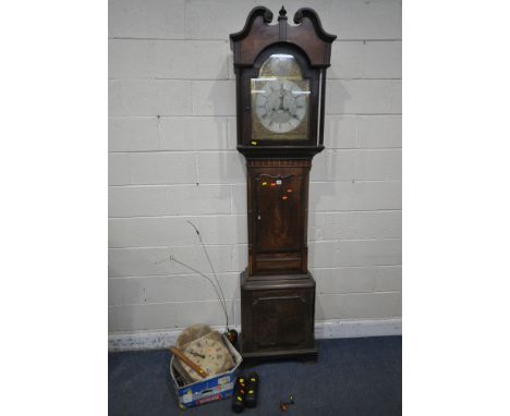 A GEORGIAN OAK AND CROSSBANDED EIGHT DAY LONGCASE CLOCK, with twin swan neck pediment and single finial, above an arched door