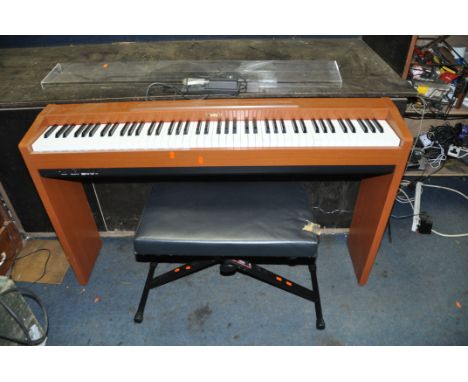 A KAWAI CL20C ELECTRONIC PIANO with F1r sustain pedal and a Stagg stool (PAT pass and working with universal power supply )(C