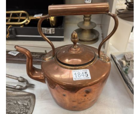 A Victorian copper kettle