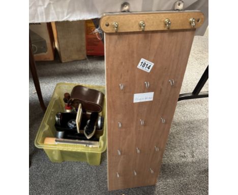 A box of shoe cleaning equipment &amp; a key rack