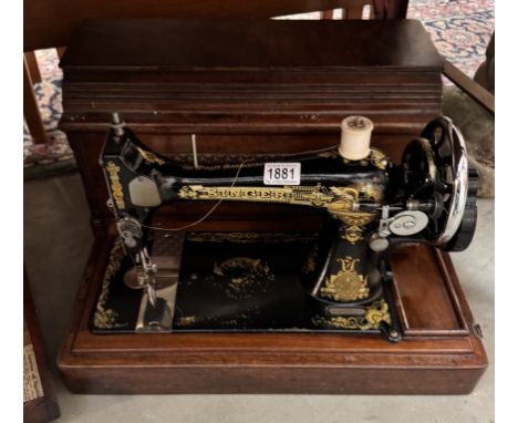 A vintage Singer sewing machine, serial number S826962