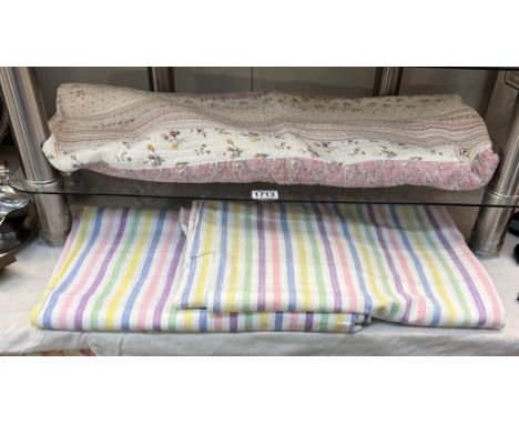 A pair of candy stripe bed sheets &amp; a throw