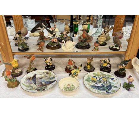 A good collection of bird ornaments &amp; plates including Goebel swan &amp; Poole robin dish etc.