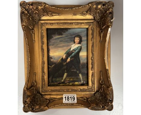 An enhance print of a boy with dog in ormolu gilt frame