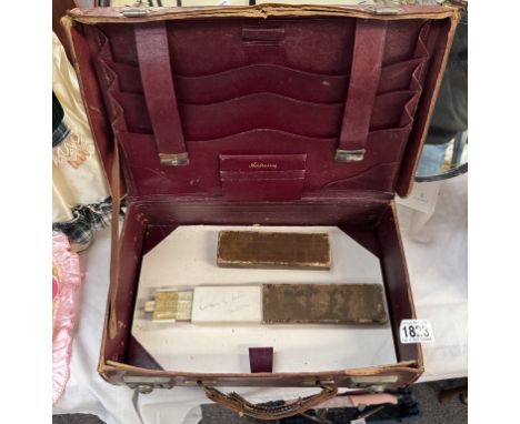 A vintage stationary writing box briefcase