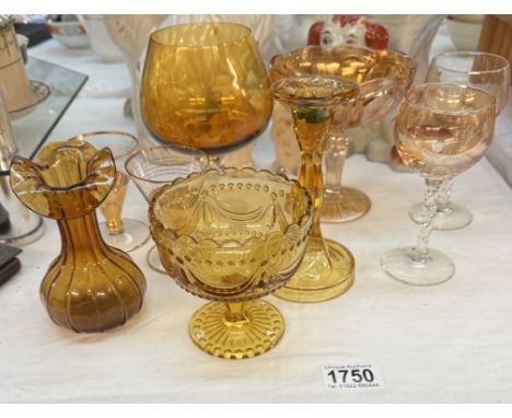 A quantity of vintage amber glass including brandy glass &amp; candlestick etc.