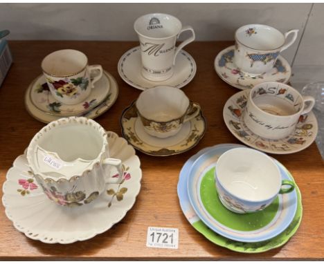 A large early 20th century moustache cup &amp; saucer &amp; 4 cups &amp; saucers