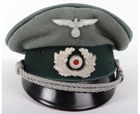 WW2 German Army Administration Officers Peaked Cap, green doeskin wool top with dark green central band. Metal cap eagle and 