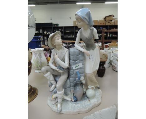 A Nao figurine - young couple at well A/F