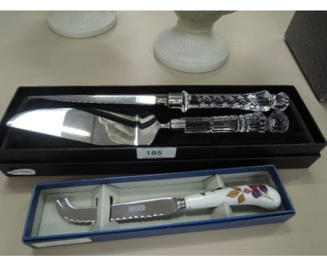 A boxed cake slice with Edinburgh crystal handle and similar letter opener, a Royal Worcester cheese knife