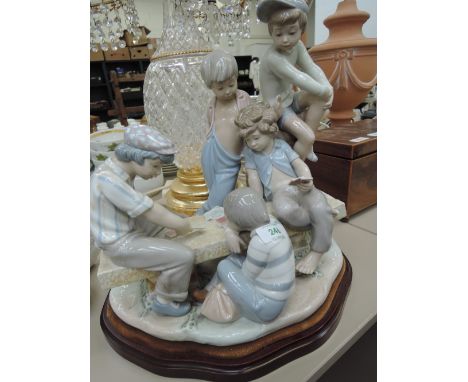 A Nao figure - children playing cards