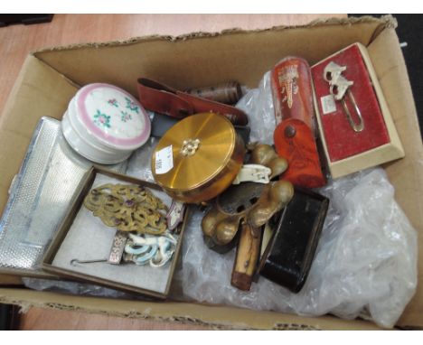 A miscellaneous box including  engine turned cigarette case, pen knives and jewellery box