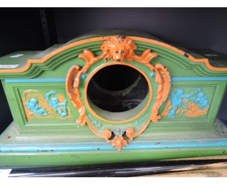 A Victorian black slate mantel clock case painted green