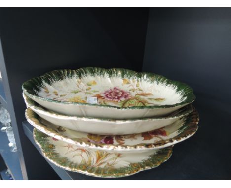 A selection of platters including B & K chrysanthemum and clematus