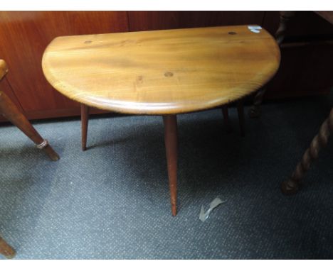 An Ercol drop leaf occasional table