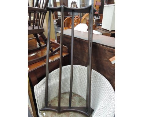 A 1970's design dark elm Ercol Delft rack