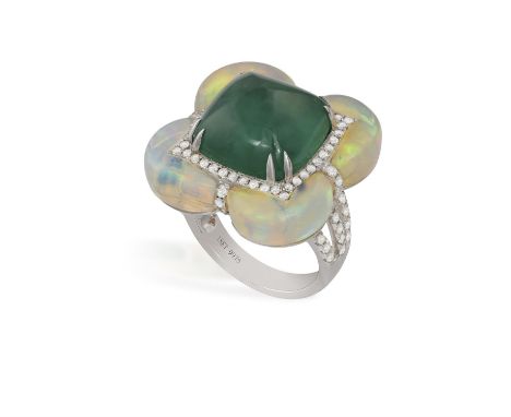 AN EMERALD, OPAL AND DIAMOND COCKTAIL RINGDesigned as a flowerhead centring a sugarloaf emerald cabochon weighing approximate