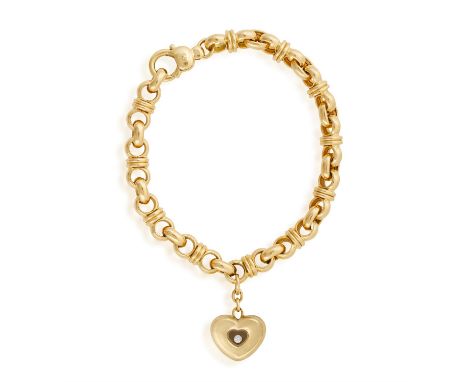 A 'HAPPY DIAMONDS' BRACELET, BY CHOPARDThe yellow gold fancy-link bracelet suspending a heart-shaped charm with glazed compar