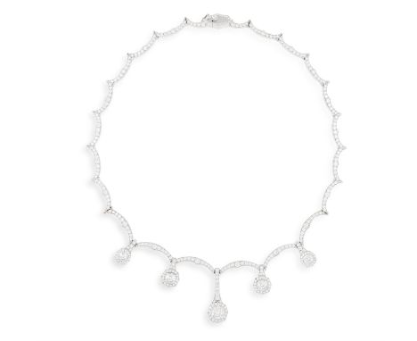 AN IMPORTANT DIAMOND 'FEMME FATALE' NECKLACE, BY STEPHEN WEBSTER, CIRCA 2005Designed as a series of graduated scalloped links