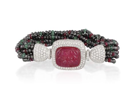 A GEM-SET AND DIAMOND BRACELET, BY MICHELE DELLA VALLESet with a carved ruby weighing 13.40cts, within a pavé-set brilliant-c