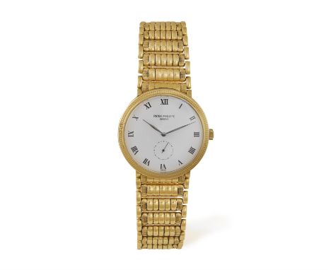 AN 18K GOLD MANUAL WIND 'CALATRAVA' WRISTWATCH, BY PATEK PHILIPPE, CIRCA 199718-jewel Cal-215, adjusted to heat, cold, isochr