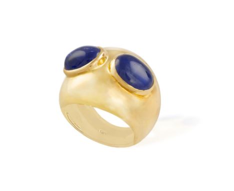 A SAPPHIRE COCKTAIL RINGOf bombé design, set with two oval-shaped cabochon sapphires within collet-setting, mounted in 18K go