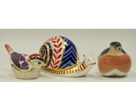 A Royal Crown Derby paperweight, Snail, first quality with gold stopper; another; a Royal Copenhagen bird model (3) 