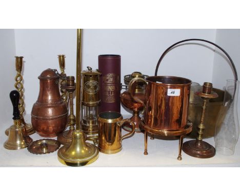 Metalware - a pair of 19th century brass twisted candlesticks; polished copper grain measure; copper oil lantern; a bell meta