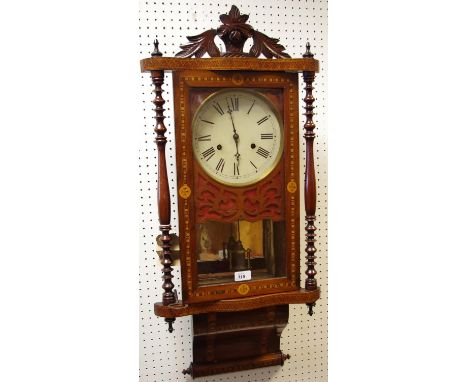 A Victorian walnut and mahogany Vienna wall clock 