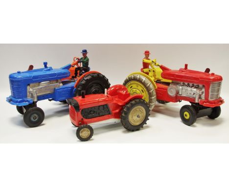 Marx Toys "Tricky Tommy" battery operated Reversible Diesel Electric Tractor - large scale plastic model is blue, with orange