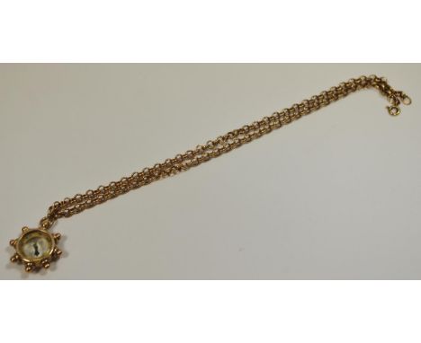 A 9ct gold round link necklace, stamped Italy 9ct; a 9ct gold pendant compass in a stylised ships wheel, Birmingham, 1926 gro