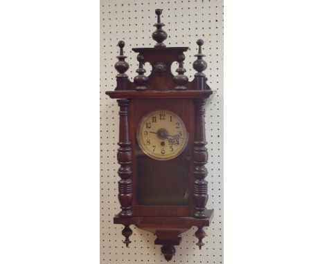 An early 20th century mahogany wall clock flanked by pilasters c.1930 