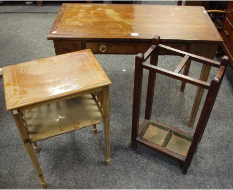 An Edwardian mahogany two tier occasional table, moulded rectangular top outlined with boxwood and ebony stringing, the under