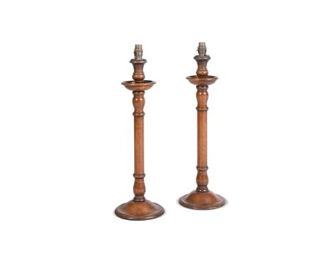 A PAIR OF TURNED AND STAINED WOOD COLUMNAR TABLE LAMP BASES 20TH CENTURY adapted for electricity 62cm high including fitting 