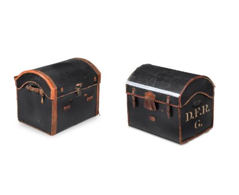 A BLACK CANVAS COATED DOME TOP TRUNK20TH CENTURYWith leather trim, two leather loop handles, a key and flip lock clasp, openi