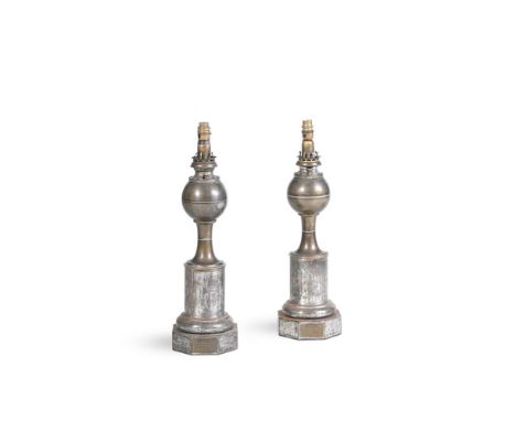A PAIR OF FRENCH PATINATED METAL PARAFIN LAMP BASES BREVET LAMPES HYDROSTATIQUE, LATE NINETEENTH CENTURY later adapted for el