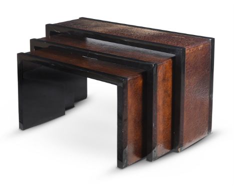 A SET OF THREE GRADUATED BLACK LACQUER AND FAUX LEATHER CONSOLE TABLES BY ANOUSKA HEMPEL 81cm high, 137.5cm wide, 46cm deep  