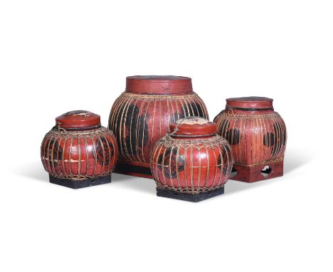 FOUR JAPANESE SPLIT CANE AND RED LACQUERED BASKETS AND COVERS FIRST HALF 20TH CENTURYPainted with stylised flowerheads The la