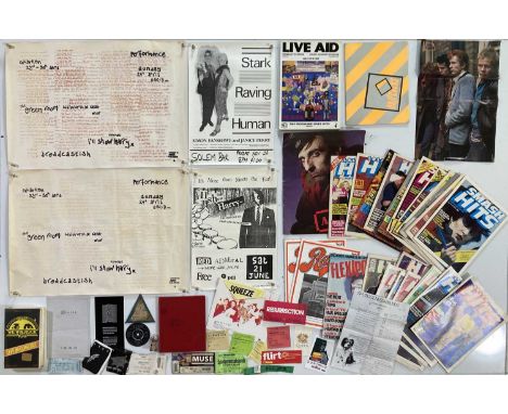 Music/concert memorabilia to inc: programmes inc: Live Aid, Alice Cooper. Buzzcocks song book. 22 magazines inc 79/80s Smash 