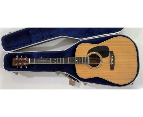 A six-string Martin HD-28 2 R acoustic guitar. With Martin hard case. Very good condition. With warranty from 'Dreadnought Gu