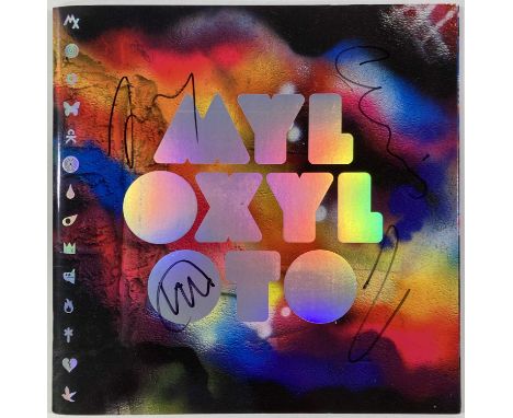 A Coldplay - Myloxyloto tour programme signed to front cover by Chris Martin, Jonny Buckland, Guy Berryman, Will Champion.